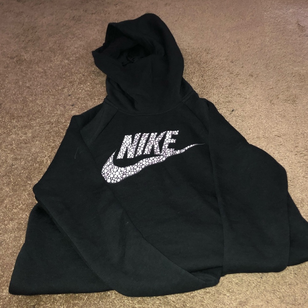 Women’s Nike hoodie size M.